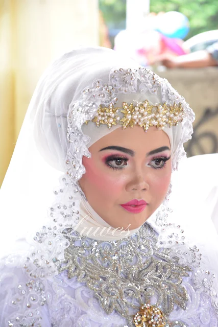 Rias pengantin muslimah dengan hijab